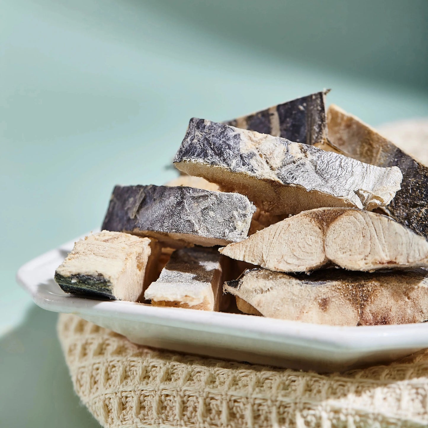 Freeze-dried mackerel pet treats in bowl