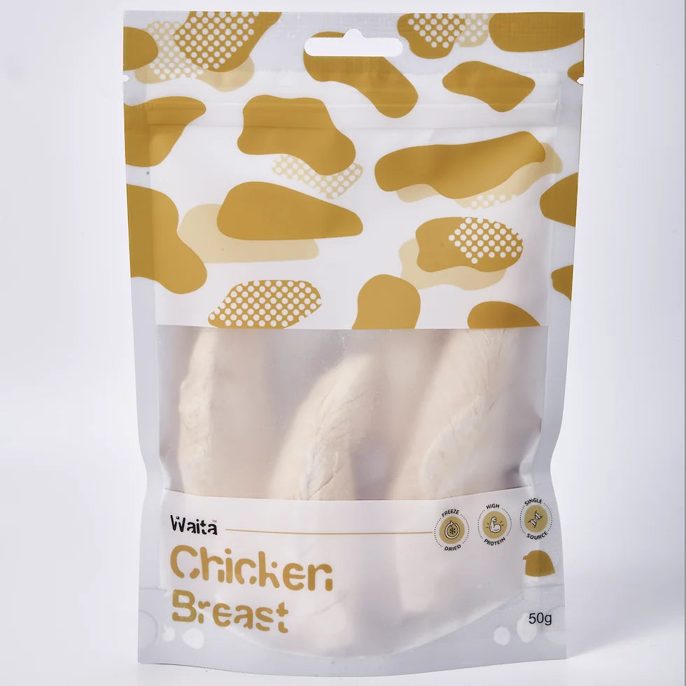 Packaged chicken breast with gold pattern on a white background
