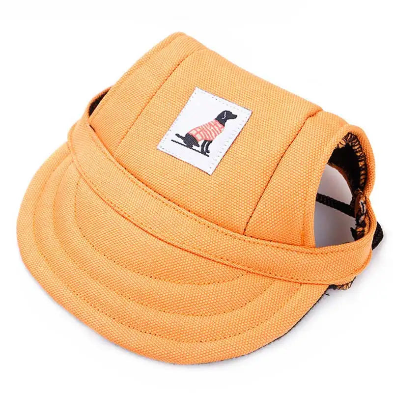 Orange pet visor with a small label featuring a dog design on a white background