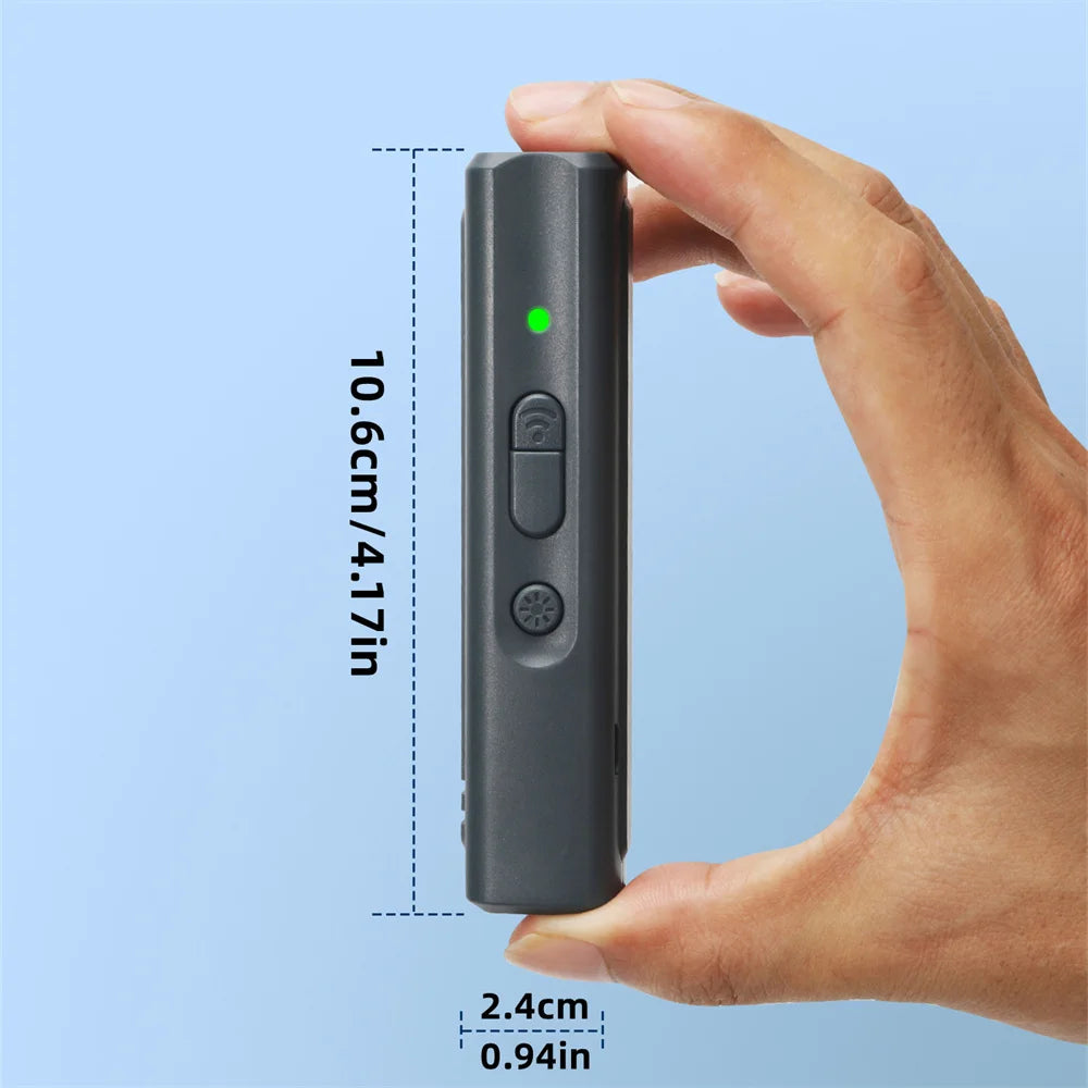 Hand holding a small black device with dimensions labeled on a blue background
