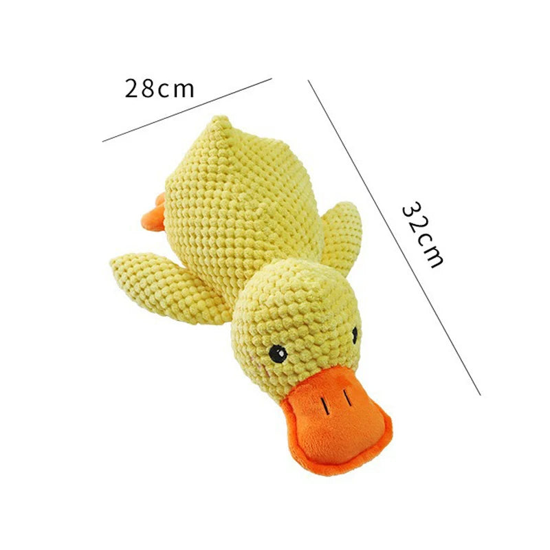 Crocheted duck toy with measurements on a white background
