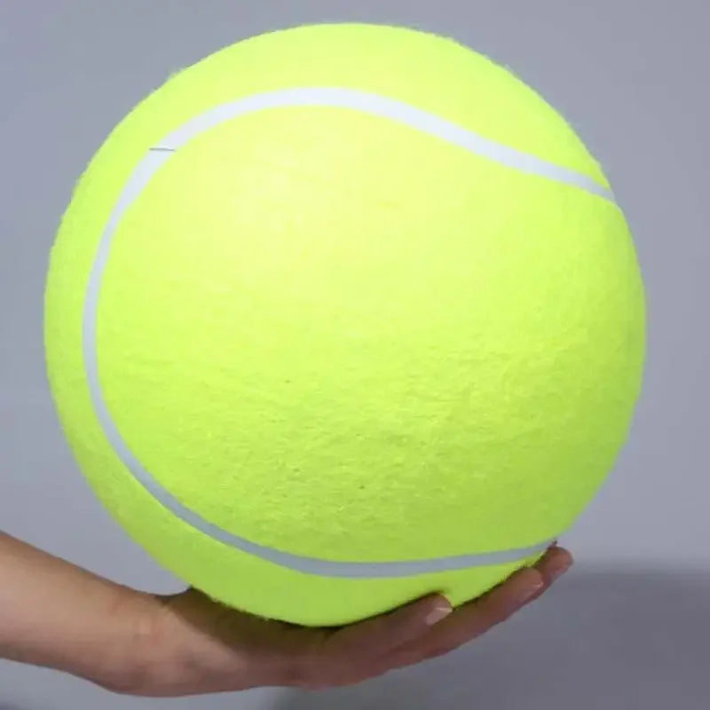 Oversized dog toy – giant tennis ball for outdoor fetch games.