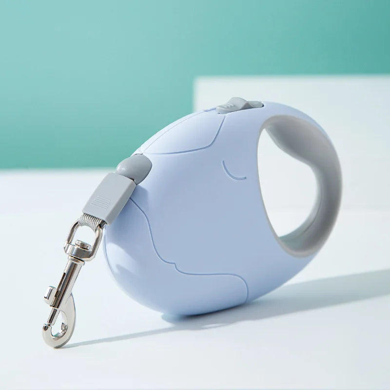 Light blue pet retractable leash on a light background