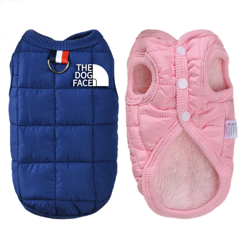 Blue and pink quilted dog vests with 'The Dog Face' logo on a white background