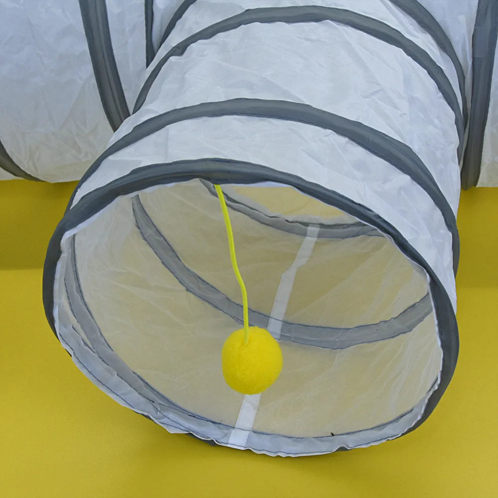 Gray pet play tunnel with a yellow ball on a yellow background