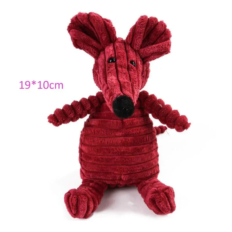 Red plush toy with a measurement label on a white background
