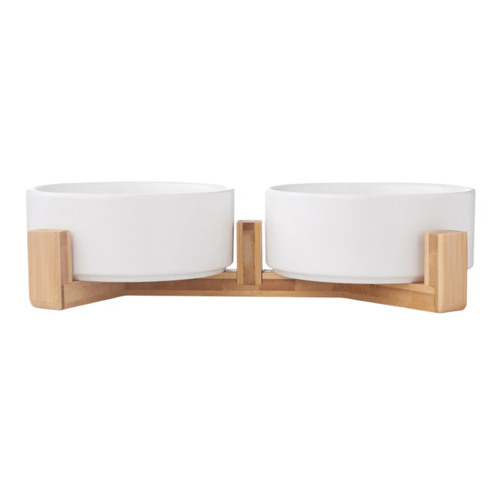 Bowl set with white bowls and wooden holder on a white background