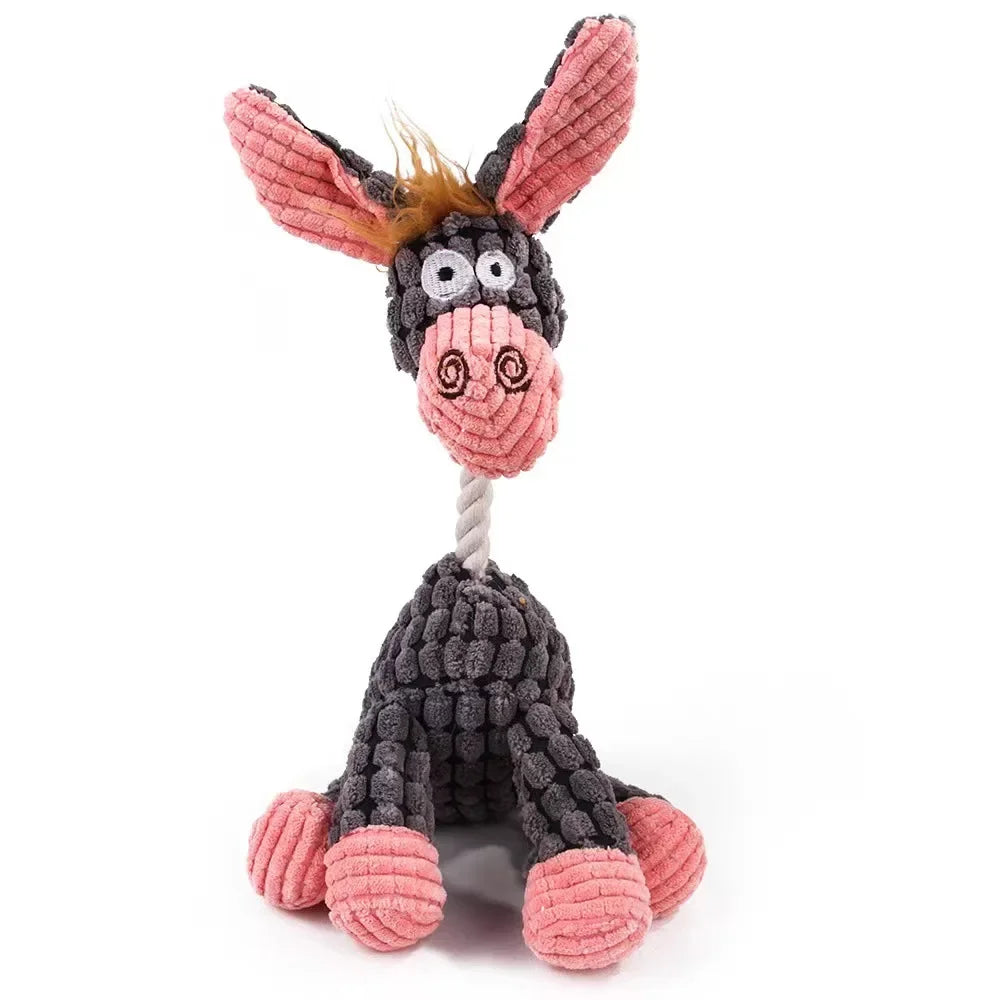 Dog toy shaped like a donkey with pink ears and body on a white background