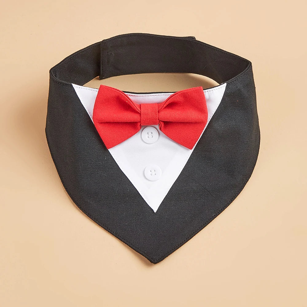 Black bandana with a red bow tie on a beige background