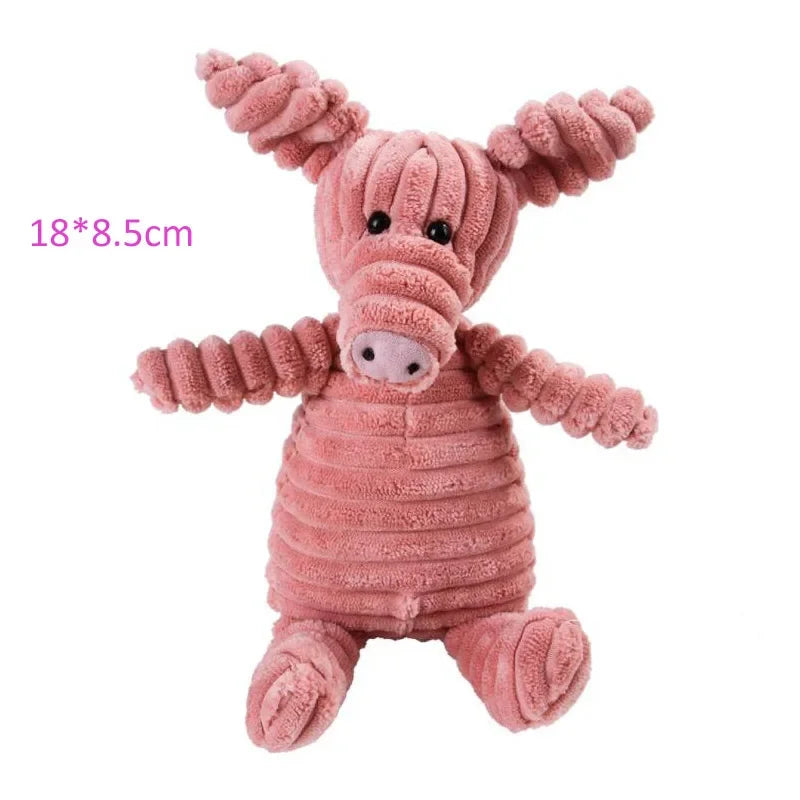 Pink plush toy with braided hair on a white background