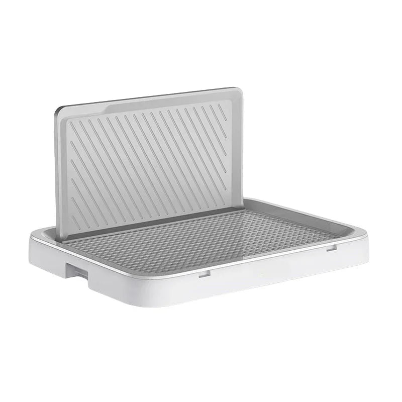Metallic grill pan on a white background