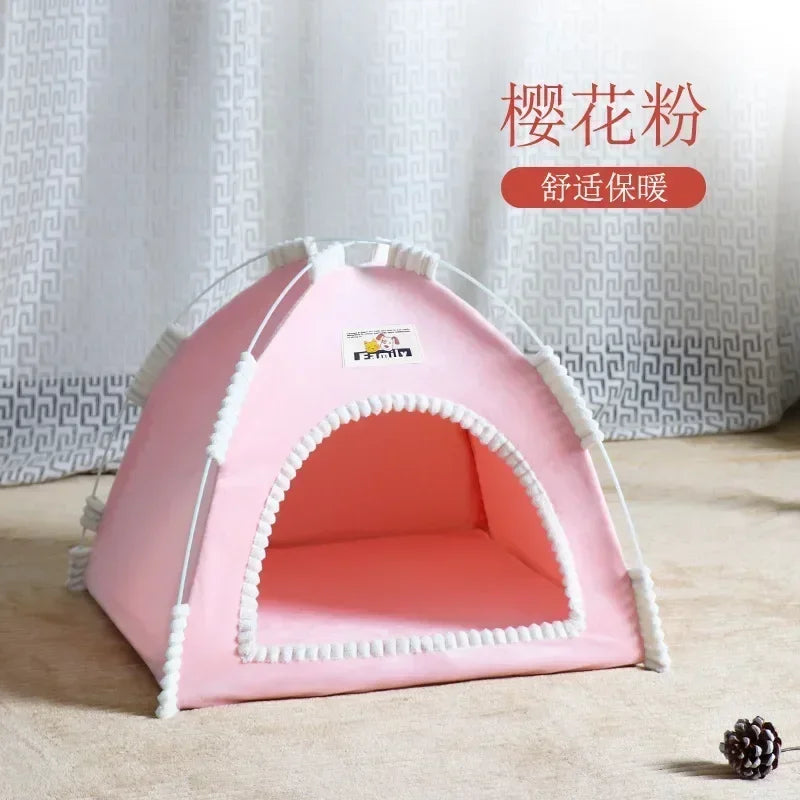 Pink pet tent with white trim on a wooden floor against a white curtain background