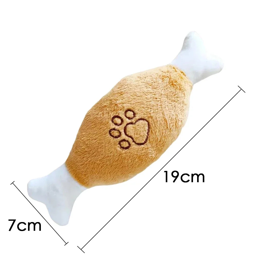 Plush toy resembling a chicken drumstick with dimensions labeled on a white background