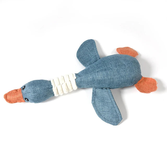 Blue toy duck with an orange beak on a white background