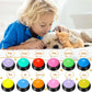 Child interacting with a dog and cat, surrounded by colorful buttons with various commands.