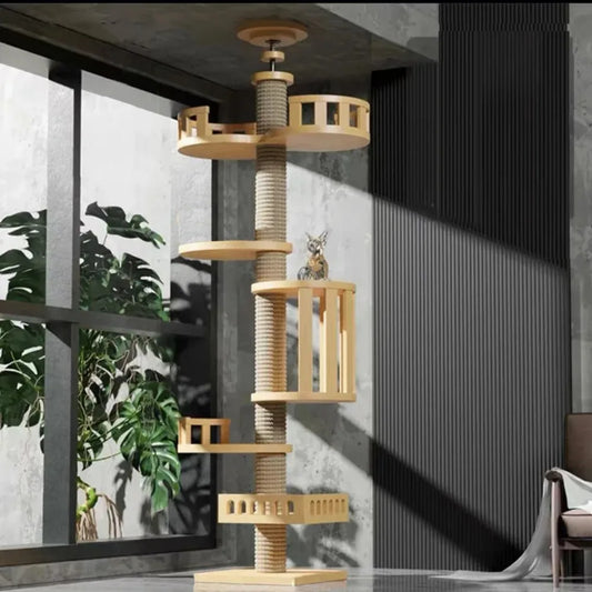 Wooden cat tree with multiple levels in a modern indoor settingCat climbing tree solid wood tower UK