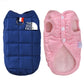 Blue and pink quilted dog vests with 'The Dog Face' logo on a white background