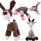 Set of four knitted animal toys on a white background