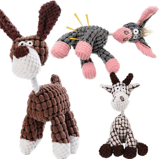 Set of four knitted animal toys on a white background