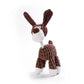Brown and white plush toy resembling a dog on a white background