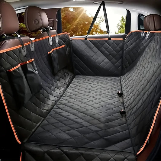 Car interior with black quilted bench cover and orange accents
