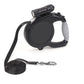 Black retractable dog leash with flashlight on a white background