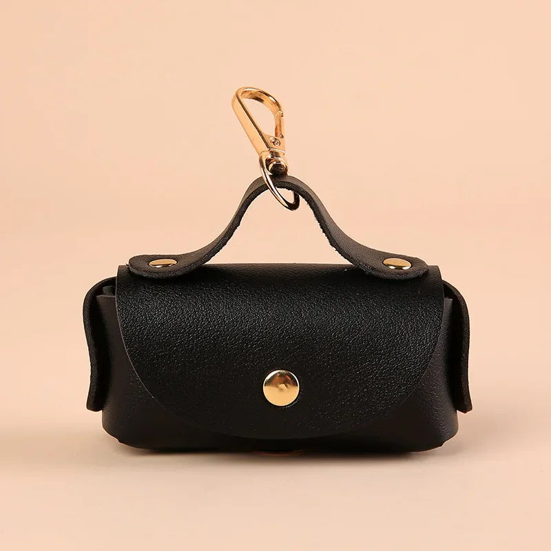 Dog poop bag holder as a stylish accessory for pet owners.